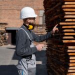 man-working-mdf-boards-warehouse_23-2149384857